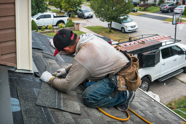 Professional Flat Roof Repair technician working in Abington, MA